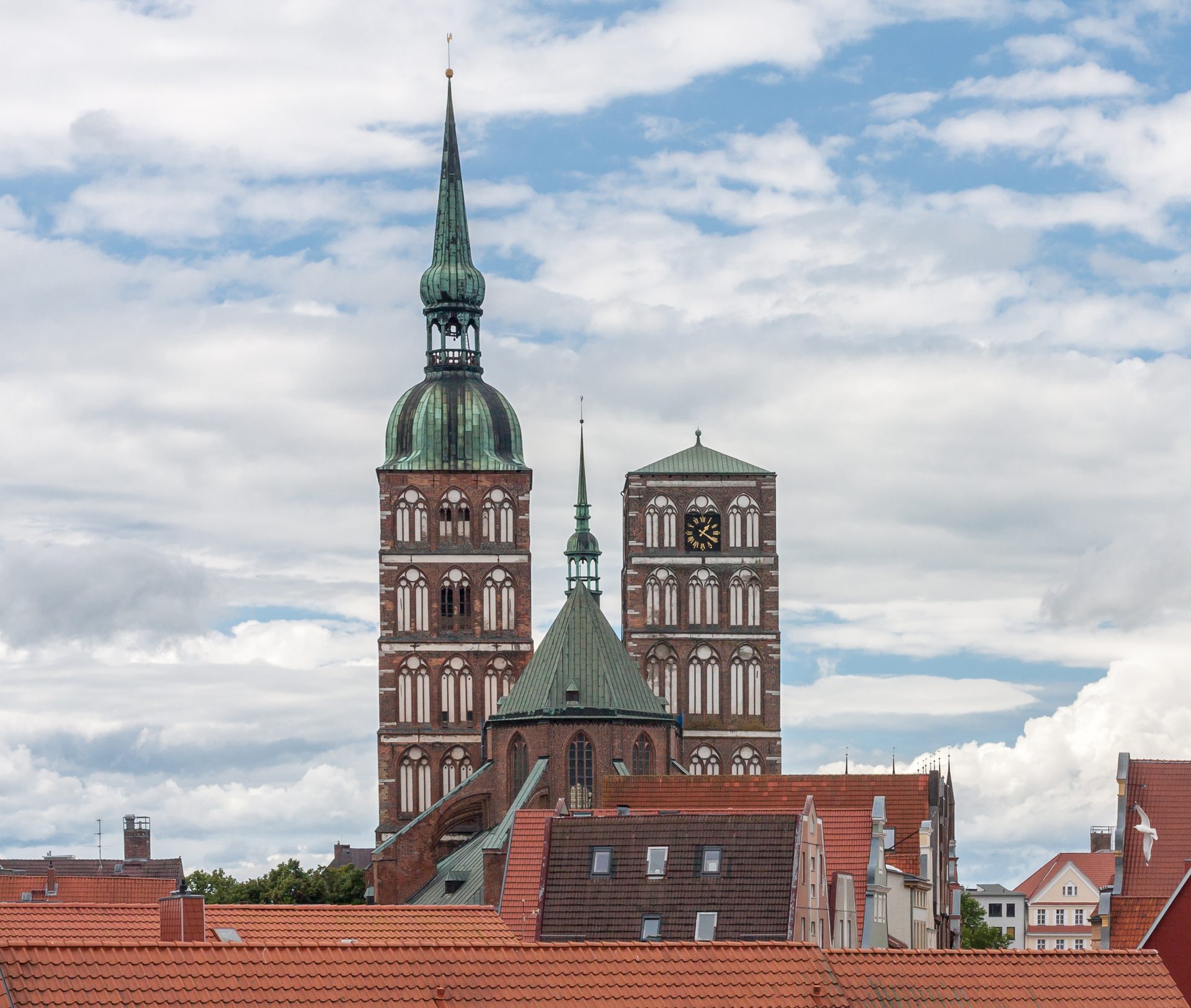 The twin towers of St Nicholas Church, Stralsund, rising above the roofs of the old town