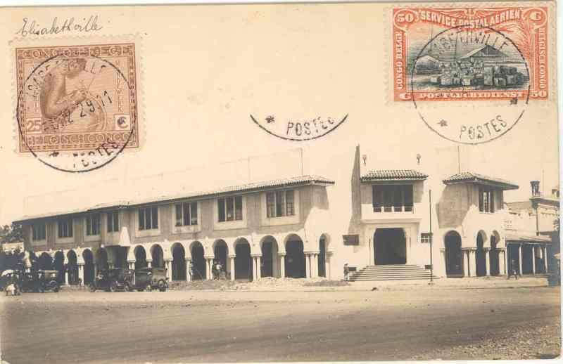 A circa-1960 postcard photograph of colonial-era municipal buildings in Elisabethville, Belgian Congo (present-day Lubumbashi, DR Congo), the city whose airfield Commander Pierre flew from during the 1952 pursuit