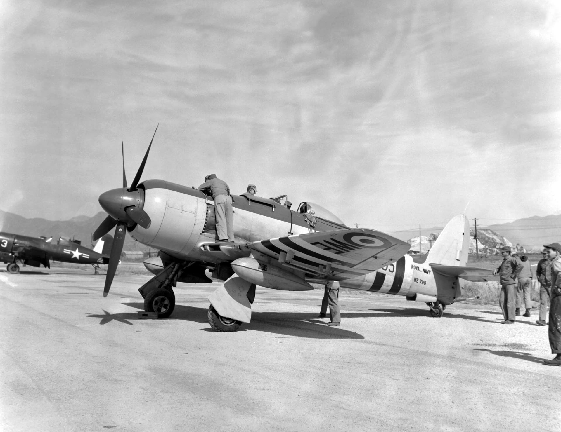 A Royal Australian Navy Hawker Sea Fury FB.11 fighter aircraft (serial WE790) of 805/808 Squadron being serviced, circa 1951 — the same aircraft type and service branch flown by Lieutenant James O'Farrell during the August 31, 1954 sighting