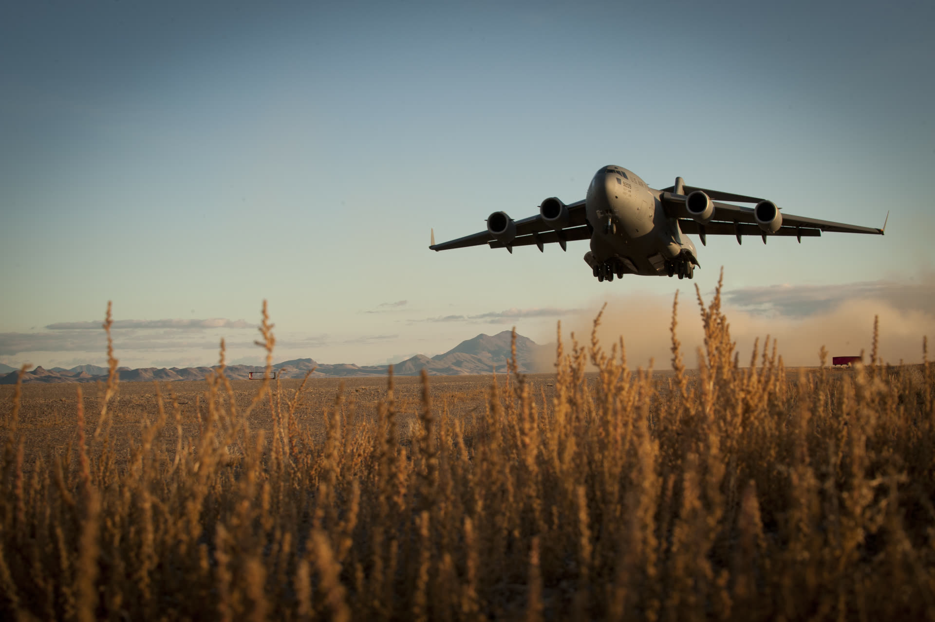 A U.S. Air Force C-17 Globemaster III takes off from an unimproved airstrip during a 2014 training exercise on the Nevada Test and Training Range, part of the wider Nellis Air Force Range