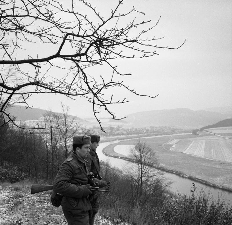 East German border guards on patrol above the Werra valley, 1965 &mdash; illustrating the closed Cold War frontier Oskar Linke and his family crossed into West Berlin two years after his reported sighting