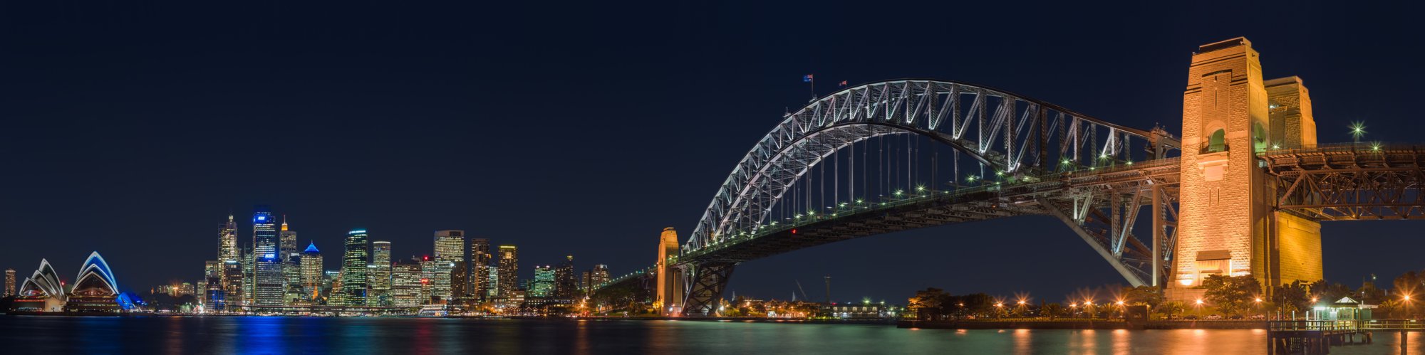 Sydney Harbour Bridge at night, illustrative of the city where Peter Khoury reported his encounters