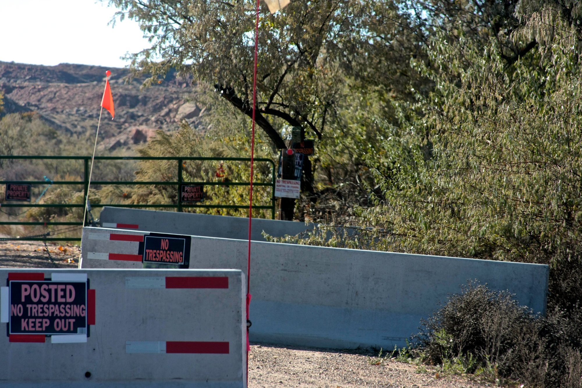 Signs and gate at the entrance to Skinwalker Ranch (also called Sherman Ranch), Uintah Basin, Utah, photographed in 2013